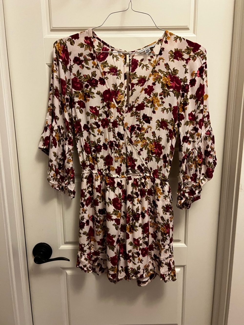 American Eagle Outfitters Floral Wrap-Style romperin Cream, Burgundy and Mustard
